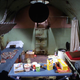 Fallout shelter originally installed in 1955 for a family of three in Fort Wayne, Indiana. The shelter cost $1,800 (over $15,000 adjusted for inflation) and contained four drop-down beds, a chemical toilet, and an air exchange device that was operated by hand-crank. The entire thing was brought to the Smithsonian in Washington, D.C. during the mid-90s, where it was on display from 1994 until 2011. (Smithsonian Magazine)